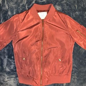 pinkish bomber jacket